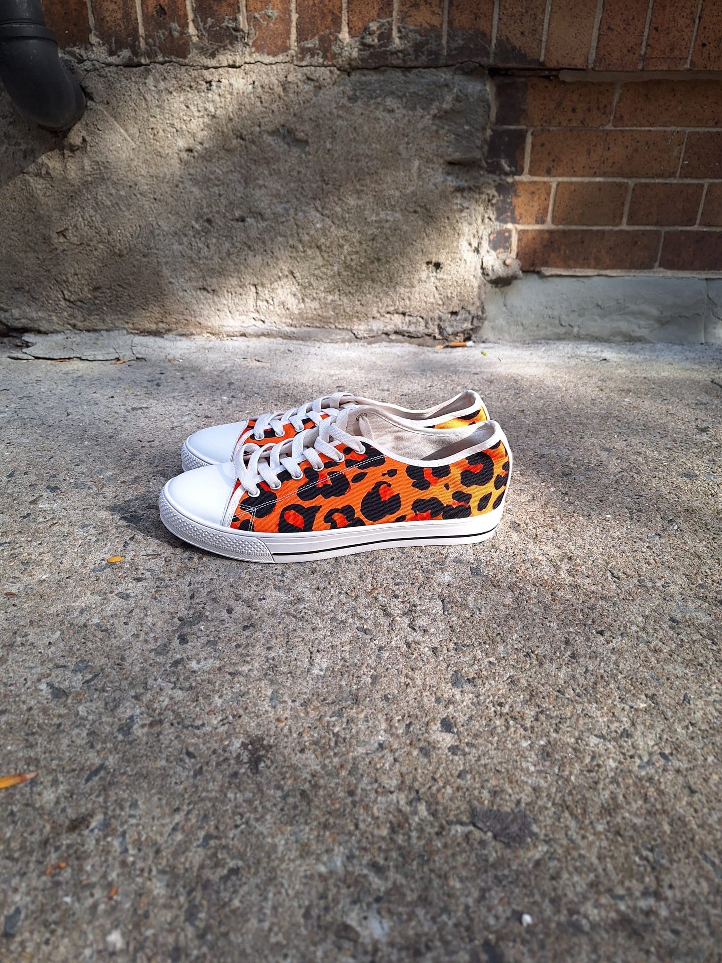 The Khool Closet: "Leopard Luxe" shoe collection Leopard print orange low top for women. 100% Vegan Suede