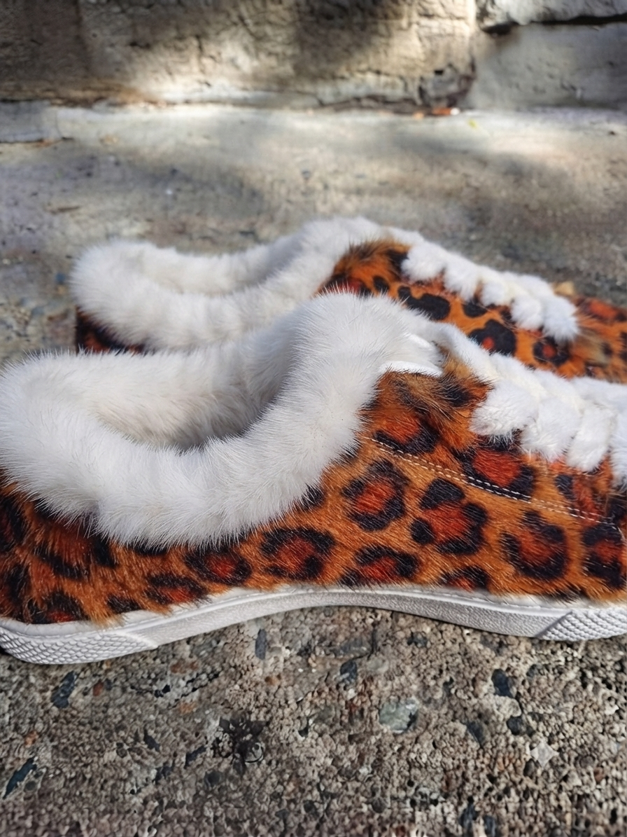 The Khool Closet "The Orange Cheetah" mink low top sneakers for women.